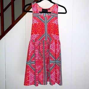 MinkPink short pink summer dress with pockets!  Racer back.  Size Small.